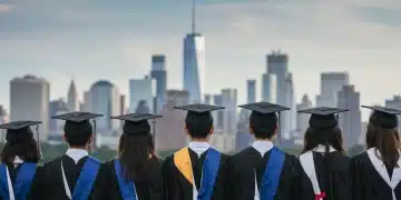 College graduates looking at a city skyline, symbolizing future career opportunities in high-demand fields.